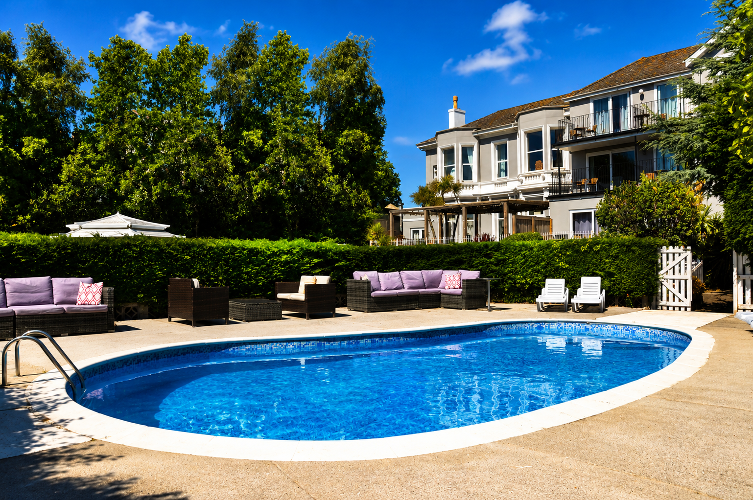 Nethway Hotel outdoor pool and terrace on a sunny day